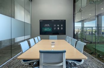 Fully-equipped business center, conference room, and huddle rooms